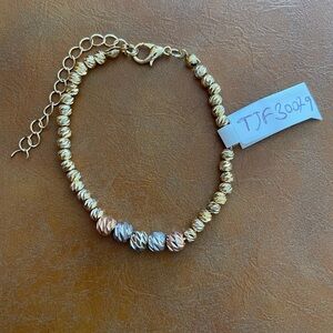 Three tone- Gold, Rose Gold, and Silver Beaded Bracelet. New with tags.